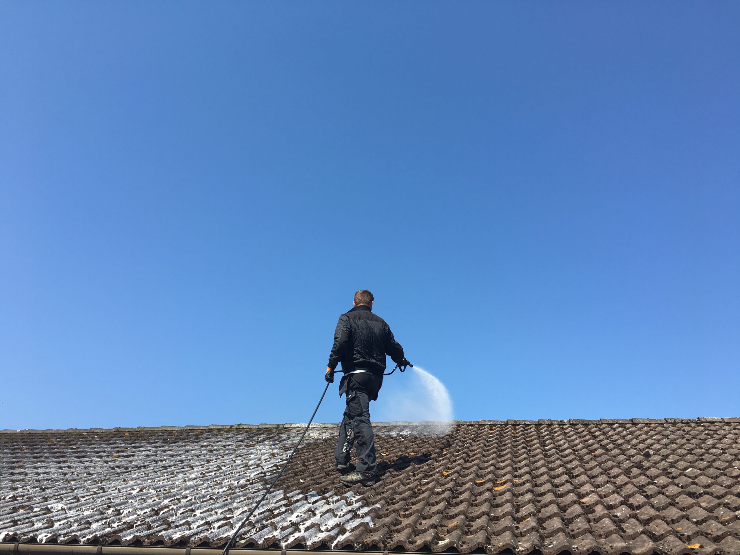 Man,Cleaning,Roof